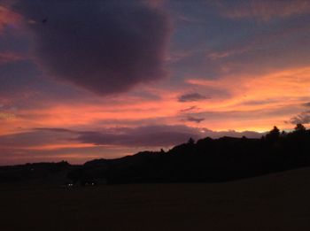 Scenic view of silhouette landscape against sky during sunset