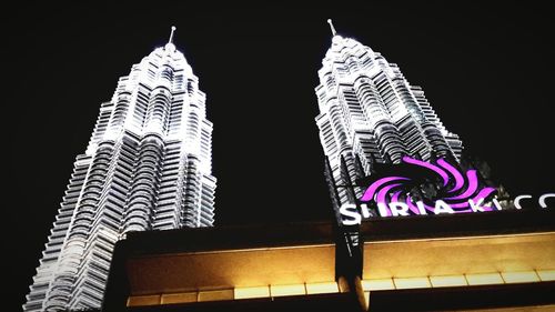 Low angle view of illuminated building at night