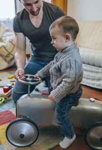 Father and son playing