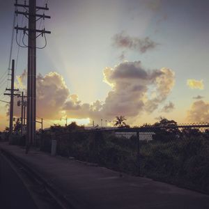 Empty road at sunset