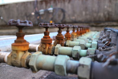 Row of rusty valve on pipelines