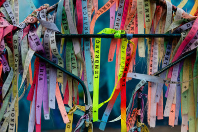 Colored ribbons of senhor do bonfim tied to an iron gate in pelourinho.