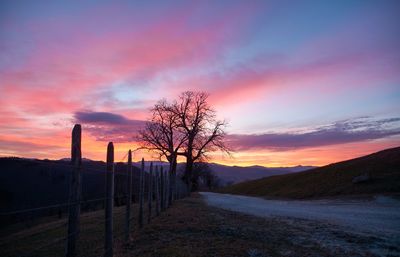 Scenic view of road against sky during sunset