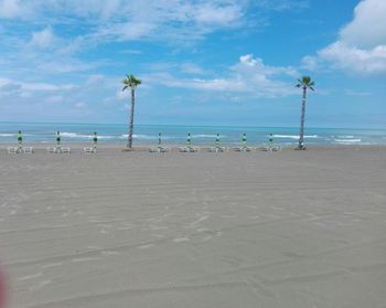 Scenic view of beach against sky