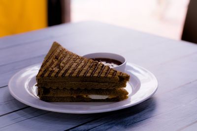 Close-up of cake served on table