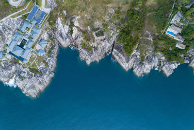 High angle view of sea and rocks