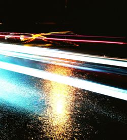 Cars on road at night