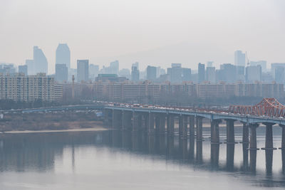 Bridge over river in city