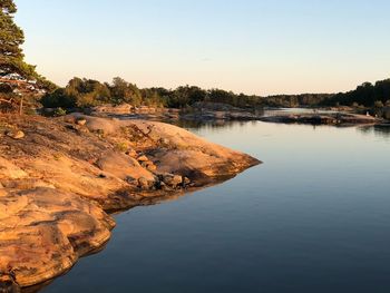 Scenic view of lake against clear sky