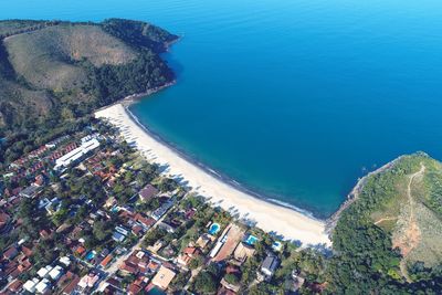 High angle view of sea and buildings