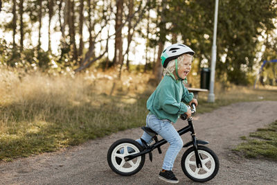 Happy child cycling