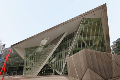 Low angle view of modern building against sky