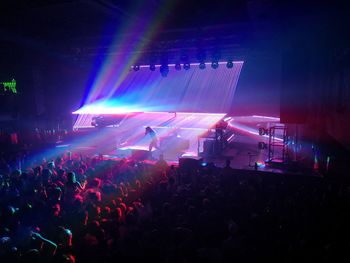 Crowd at music concert at night