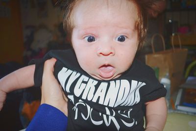 Portrait of cute baby girl at home