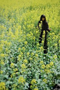 Full length of person standing on field