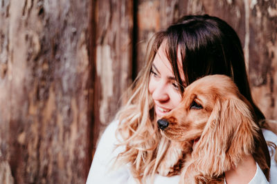 Portrait of woman with dog