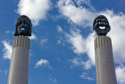 Low angle view of statue against sky