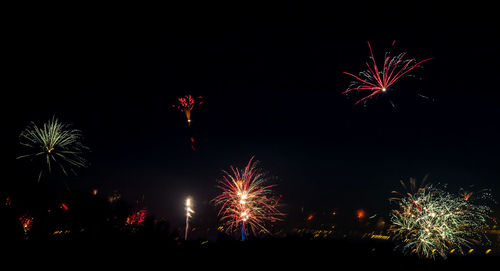 Firework display at night