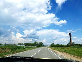 Road seen through car windshield