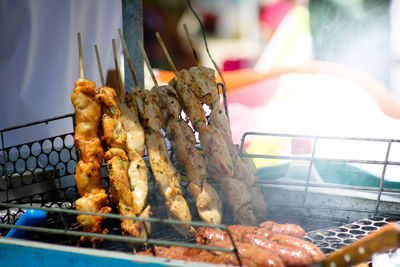 Close-up of meat on barbecue grill