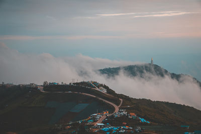 High angle view of city against cloudy sky