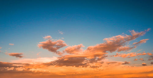 Low angle view of cloudy sky during sunset