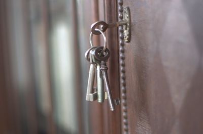 Close-up of chain hanging on door