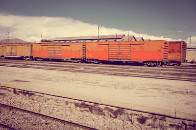 Train on railroad track against sky