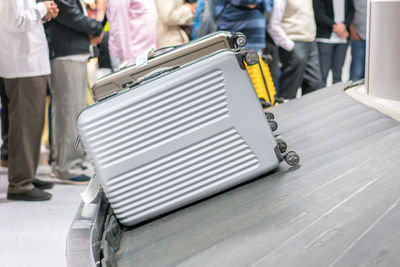 Luggage on conveyor belt at airport