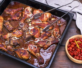 High angle view of chicken in tray on table