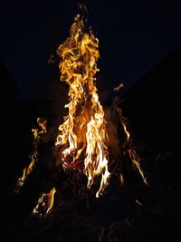 Bonfire on field at night