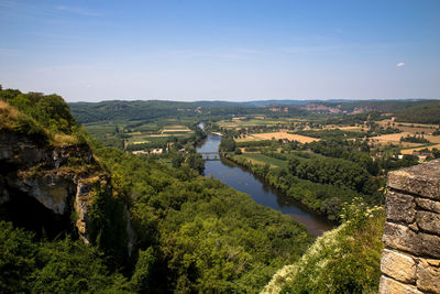 High angle view of river amidst landscape against sky