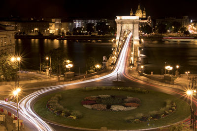 High angle view of light trails on road at night