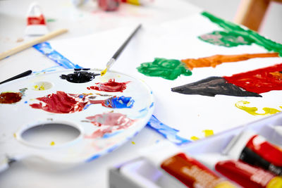 Close-up of watercolor paints on table