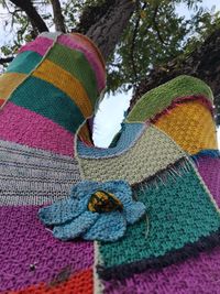 Close-up of multi colored pencils in park during winter