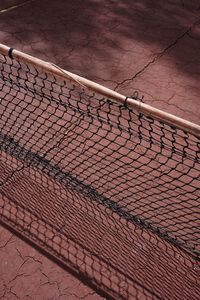 Old abandoned tennis court, sports equipment