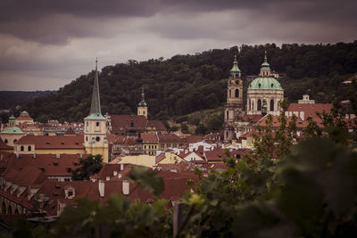 Panoramic view of buildings and city against sky