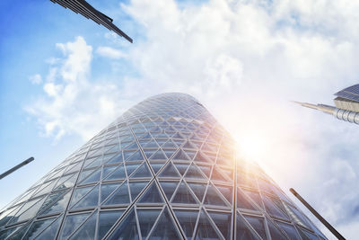 Low angle view of bird flying against sky