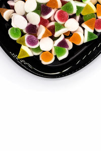 High angle view of candies in plate