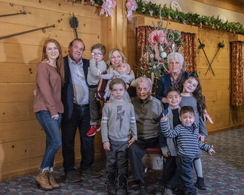 Portrait of happy family at home during christmas