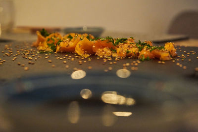 Surface level view of yellow flowers on table