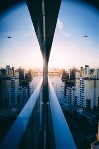 Modern buildings in city against sky