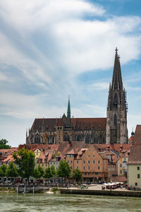 View of buildings against sky in city