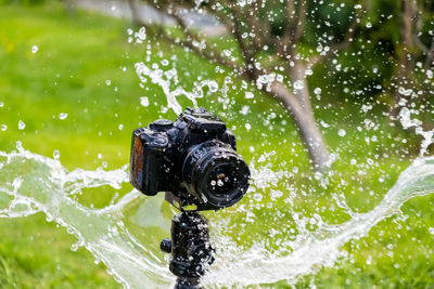 Close-up of camera on rock