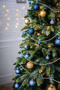 Close-up of christmas decoration hanging on tree