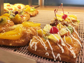 Close-up of fruits in plate on table