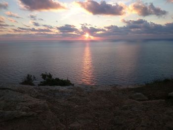 Scenic view of sea against sky during sunset