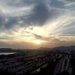 High angle view of cityscape against sky during sunset