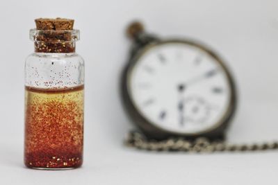 Close-up of clock on table