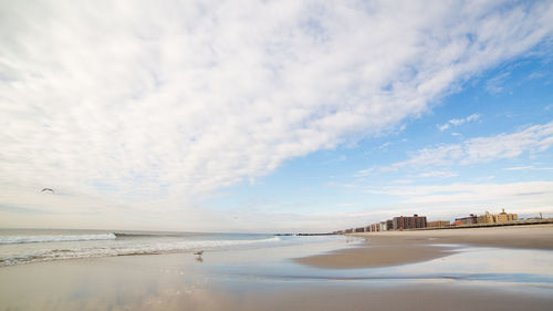 Scenic view of beach against sky